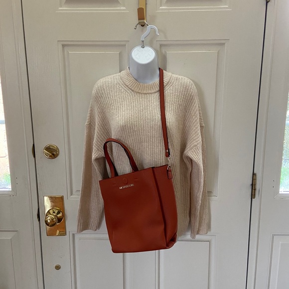 Michael Kors Handbags - NWOT Michael Kors Pumpkin Colored Purse